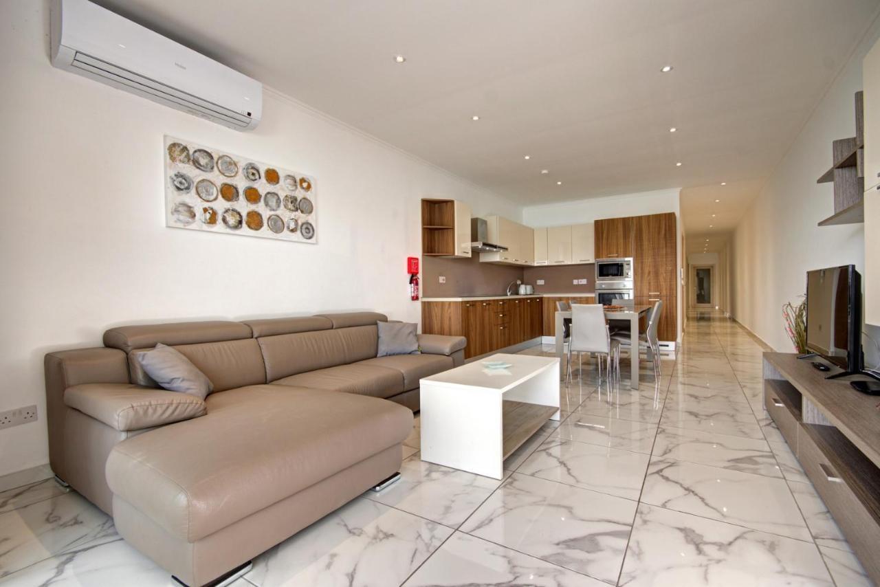 Malta'S Beachfront Apartment In Меллиеха Экстерьер фото